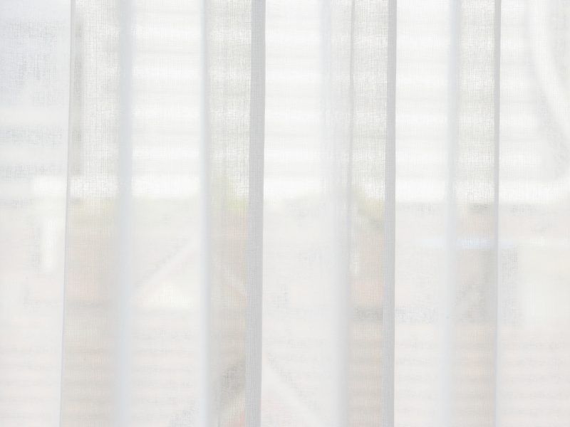 Translucent window blinds or curtains on window. Translucent window blinds or curtains on window.